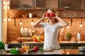 Happiness is cooking Happy young woman cooking vegetables in modern kitchen. Cozy interior Royalty Free Stock Photo