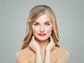 Portrait of blonde woman with healthy hair, clear skin and red lips makeup. Perfect female face Royalty Free Stock Photo