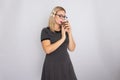 Portrait of blonde woman holding cup of coffee on white background Royalty Free Stock Photo