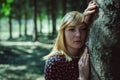 Portrait of blonde woman in summer dress