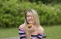 Blondes.Beautiful girls with long hair.Chocolate croissant. Royalty Free Stock Photo