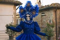Portrait of blue mask at the carnival of Castiglion Fibocchi in Tuscany, Italy