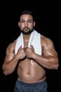Portrait of a bodybuilder man with a towel