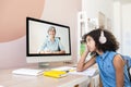 An African schoolgirl is learning online Royalty Free Stock Photo