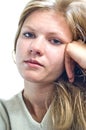 Portrait of a bored girl. Isolated over white Royalty Free Stock Photo