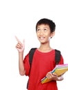 Portrait of boy with backpack pointing Royalty Free Stock Photo