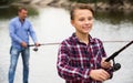 Portrait of boy casting line for fishing Royalty Free Stock Photo