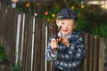 Portrait of a boy , a child holding a slingshot