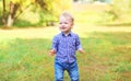 Portrait boy child outdoors walking in park Royalty Free Stock Photo