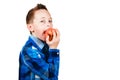 Portrait of boy eat apple. Isolated on white background Royalty Free Stock Photo