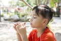 Portrait of a boy eating bread ice cream roll sandwich Royalty Free Stock Photo