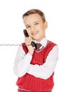Portrait Boy emotionally talking on the wired telephone on whit Royalty Free Stock Photo
