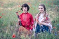 Portrait of a boy and a girl in the field. Royalty Free Stock Photo