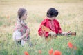 Portrait of a boy and a girl in the field. Royalty Free Stock Photo