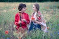 Portrait of a boy and a girl in the field. Royalty Free Stock Photo