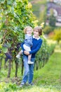 Portrait of boy with his baby sister in vine yard Royalty Free Stock Photo