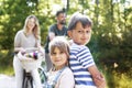 Portrait of boy and little girl  in the woods Royalty Free Stock Photo