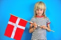 Portrait of a boy with flag of Denmark