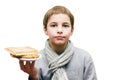 Portrait of a boy offering a waffle - isolated on white Royalty Free Stock Photo