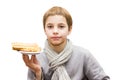 Portrait of a boy offering a waffle - isolated on white Royalty Free Stock Photo