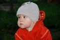 Portrait of boy in orange jacket