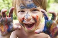Portrait Of Boy With Painted Face and Hands Royalty Free Stock Photo