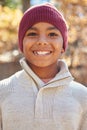 Portrait Of Boy Playing In Autumn Woods Royalty Free Stock Photo