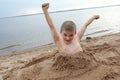 Portrait of boy on sandy beach Royalty Free Stock Photo