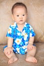 Portrait of boy with Songkran flower shirt Royalty Free Stock Photo