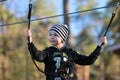 Portrait of a boy surmounting obstacles