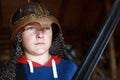 Boy in Viking helmet