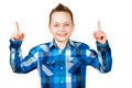 Portrait boy, wearing shirt, point fingers up. Isolated on white background Royalty Free Stock Photo