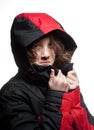 Portrait of a Boy in Winter Jacket with Hood