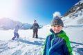 Portrait of a boy over girls play snowball fight