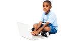 Portrait of boy working on laptop Royalty Free Stock Photo