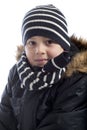 Portrait of boy wrapped in winterclothes Royalty Free Stock Photo