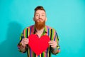 Portrait of boyfriend with beard plump lips wearing striped shirt send kiss you with big heart symbol isolated on blue Royalty Free Stock Photo