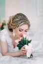 Portrait of bride in flower decor, studio photo. Beautiful Bride portrait wedding makeup and hairstyle, fashion bride model jewelr Royalty Free Stock Photo