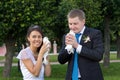 Portrait of bride and groom in the hands of the do Royalty Free Stock Photo