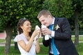 Portrait of bride and groom in hands of pigeons Royalty Free Stock Photo