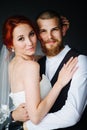 Portrait of a bride and groom standing closely together Royalty Free Stock Photo
