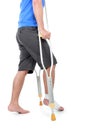 Portrait of a broken foot using crutch