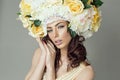 Portrait of brunette with floral headpiece