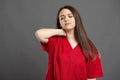 Portrait of a brunette nurse having side neck pain