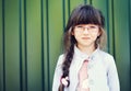 Portrait of brunette toddler girl in glasses