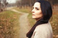 Portrait of brunette woman with thick beautiful long hair close outdoor