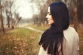 Portrait of brunette woman with thick beautiful long hair close outdoor