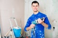 Portrait of builder handyman with electric drill Royalty Free Stock Photo