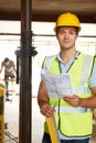Portrait Of Builder On Site With Plans Royalty Free Stock Photo