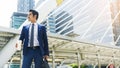 portrait of business asia man stand with paper cup